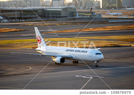 Scenery of Haneda Airport ・ Taxiing passenger plane ・ Japan Airlines Boeing 767 Scenery of Haneda Airport ・ Taxiing passenger plane ・ Japan Airlines Boeing 767 109676979