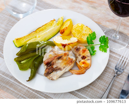 Portion of just cooked rabbit with vegetables Portion of just cooked rabbit with vegetables 109677613