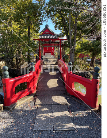 Benzaiten's red bridge and torii gate Benzaiten's red bridge and torii gate 109680851