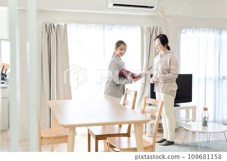 Real estate sales staff providing information on furnished properties Real estate sales staff providing information on furnished properties 109681158