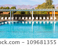 swimming pool with moutain and blue sky 109681355