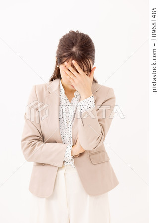 Woman covering her face business 109681485