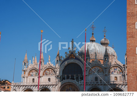 Breathtaking view of St. Mark's Square in Venice, Italy, with St. Mark's Basilica in the background. Vibrant atmosphere, unique architecture, and iconic landmarks make it a must-visit destination. Breathtaking view of St. Mark's Square in Venice, Italy, with St. Mark's Basilica in the background. Vibrant atmosphere, unique architecture, and iconic landmarks make it a must-visit destination. 109682777