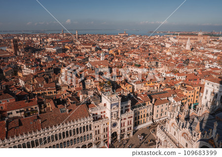 A breathtaking aerial view of Venice, Italy, showcasing the city's iconic canals, bridges, and architecture. This stunning bird's-eye perspective captures the beauty and tranquility of Venice A breathtaking aerial view of Venice, Italy, showcasing the city's iconic canals, bridges, and architecture. This stunning bird's-eye perspective captures the beauty and tranquility of Venice 109683399