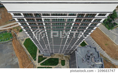 Beautiful multi-storey building standing on construction site top view 109683747