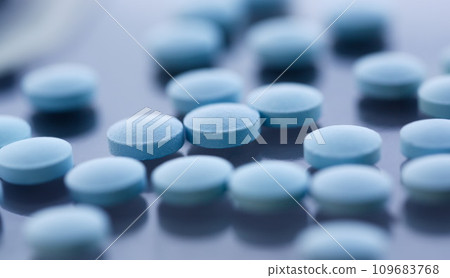 Tablets scattered on the table of the 109683768