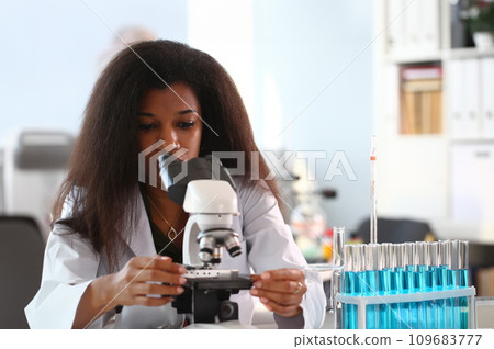Black woman scientist student chemist in protective Black woman scientist student chemist in protective 109683777