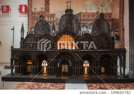 Highly detailed model of a church on display in a museum, showcasing intricate details of domes, spires, and architectural features. Part of a collection of shots of Venice, Italy. Highly detailed model of a church on display in a museum, showcasing intricate details of domes, spires, and architectural features. Part of a collection of shots of Venice, Italy. 109683782