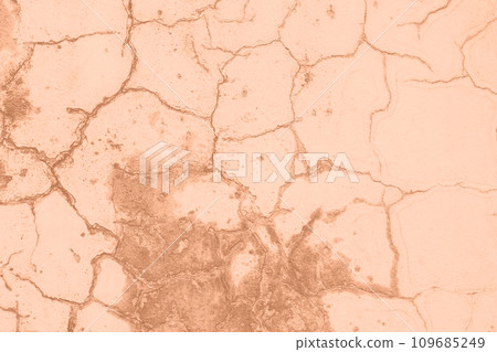 Peach Fuzz toned colour grunge decorative wall background. Art rough stylized texture banner trendy color 2024. Grunge Peach Fuzz color texture 109685249