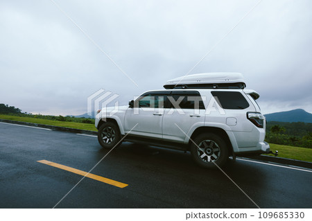 Off road car on top of mountain trail, China 109685330