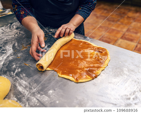 Making sweet homemade salted caramel babka 109688916