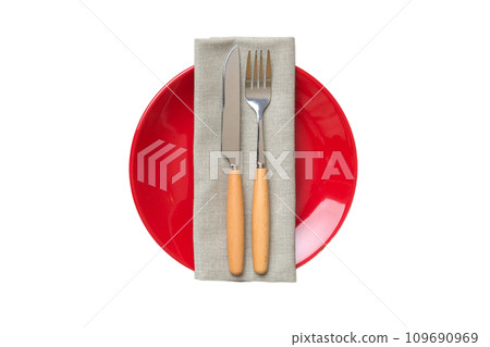 isolated christmas Plate with decor and fork and spoon. New year holiday background. Top view isolated christmas Plate with decor and fork and spoon. New year holiday background. Top view 109690969