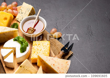 Various cheese on board Various cheese on board 109691605