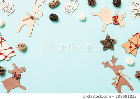 Top view of Christmas decorations on blue background. New Year holiday concept with copy space 109691822