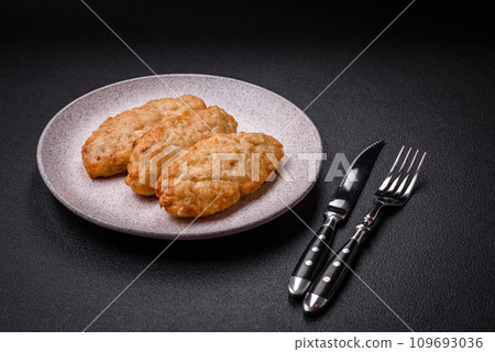 Delicious fresh fried minced fish or chicken cutlets with spices and herbs 109693036