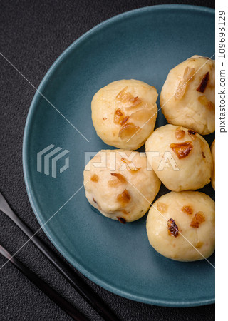 Delicious fresh cooked homemade dumplings with cheese, potatoes and salt 109693129