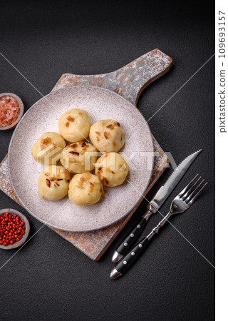 Delicious fresh cooked homemade dumplings with cheese, potatoes and salt Delicious fresh cooked homemade dumplings with cheese, potatoes and salt 109693157