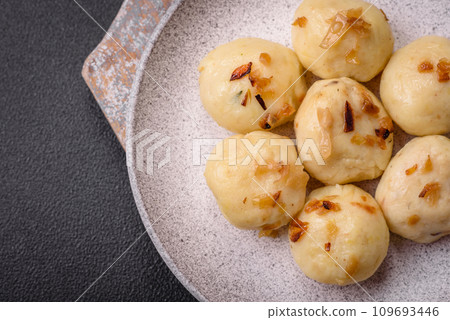 Delicious fresh cooked homemade dumplings with cheese, potatoes and salt 109693446