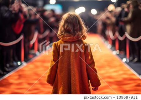 Child girl walks red carpet. Success natural. Generate AI 109697911