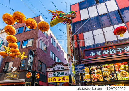 Yokohama cityscape in Japan 2024 Yokohama Chinatown with Chinese New Year lights. Dragon lanterns appear on Chinatown Boulevard = November 3rd 109700022
