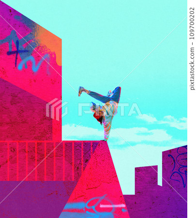 Dangerous and extreme hobby. Young man in sport style clothes doing street parkour, practicing stunts. Contemporary art collage. Sport. Urban style 109700202