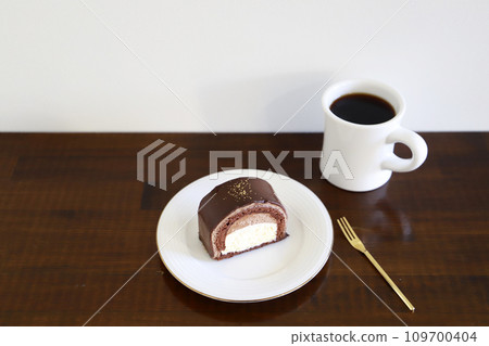 Chocolate cake and coffee Chocolate cake and coffee 109700404