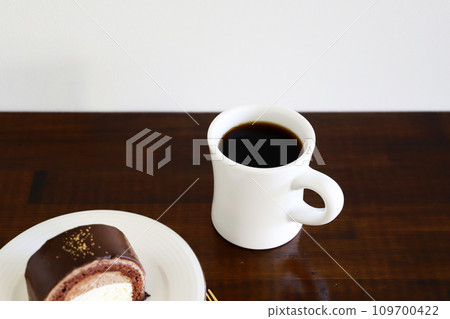 Chocolate cake and coffee Chocolate cake and coffee 109700422