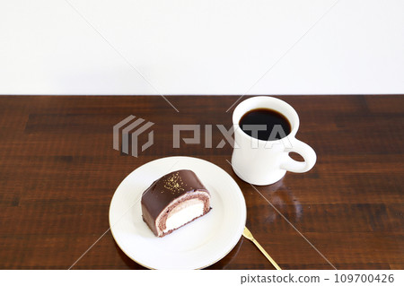 Chocolate cake and coffee Chocolate cake and coffee 109700426