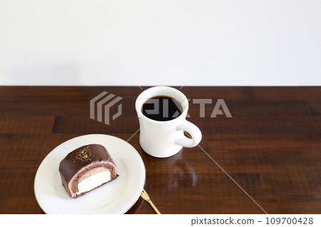 Chocolate cake and coffee Chocolate cake and coffee 109700428