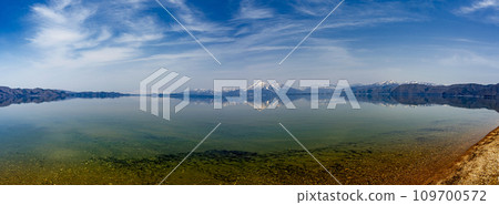Panoramic view of Mt. Bandai from the shore of Lake Inawashiro Panoramic view of Mt. Bandai from the shore of Lake Inawashiro 109700572
