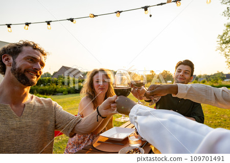 Sunset Toasts: Savoring the Moment with Friends 109701491