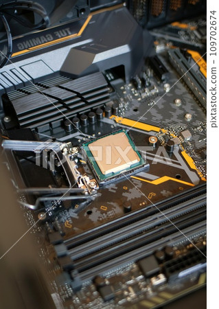 Comptuer processor and motherboard, microchip details close view. Hi-tech innovation background 109702674