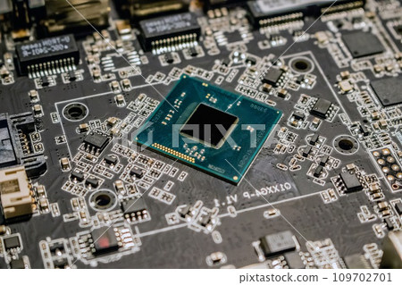 Comptuer processor and motherboard, microchip details close view. Hi-tech innovation background Comptuer processor and motherboard, microchip details close view. Hi-tech innovation background 109702701