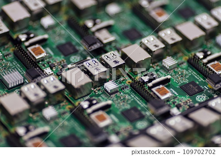Comptuer processor and motherboard, microchip details close view. Hi-tech innovation background Comptuer processor and motherboard, microchip details close view. Hi-tech innovation background 109702702