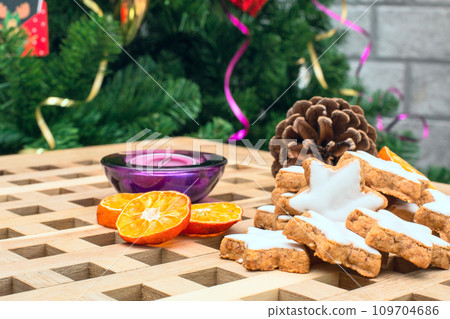 Christmas background with cookies and decorations Christmas background with cookies and decorations 109704686