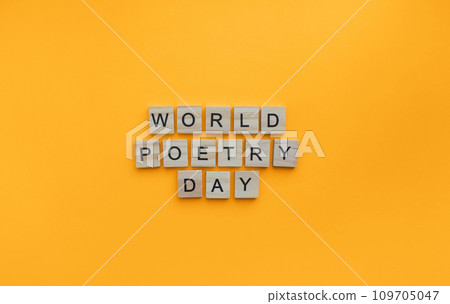 March 21, World Poetry Day, minimalistic banner with wooden lettering 109705047