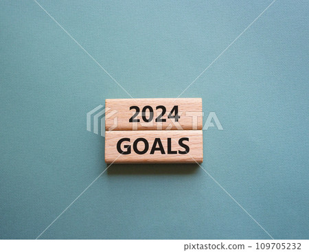 2024 Goals symbol. Wooden blocks with words 2024 Goals. Beautiful grey green background. Business and 2024 Goals concept. Copy space. 109705232