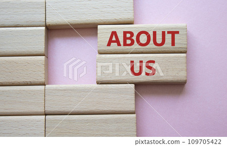 About us symbol. Concept word About us on wooden blocks. Beautiful pink background. Business and About us concept. Copy space About us symbol. Concept word About us on wooden blocks. Beautiful pink background. Business and About us concept. Copy space 109705422