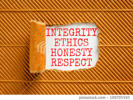 Integrity ethics honesty respect symbol. Concept word Integrity Ethics Honesty Respect on beautiful white paper. Beautiful brown paper background. Business integrity ethics honesty respect concept. Integrity ethics honesty respect symbol. Concept word Integrity Ethics Honesty Respect on beautiful white paper. Beautiful brown paper background. Business integrity ethics honesty respect concept. 109705593