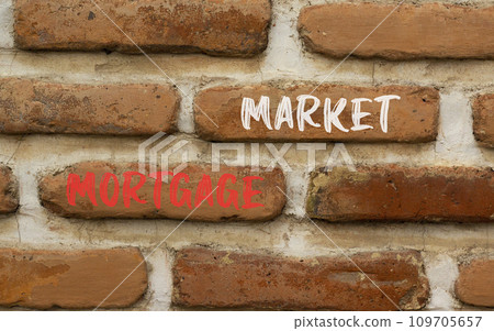 Mortgage market symbol. Concept words Mortgage market on beautiful brown brick wall. Beautiful brown brick wall background. Business mortgage market concept. Copy space. Mortgage market symbol. Concept words Mortgage market on beautiful brown brick wall. Beautiful brown brick wall background. Business mortgage market concept. Copy space. 109705657