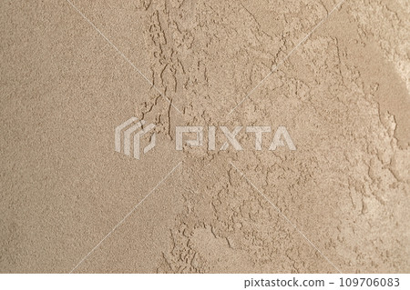 Clay wall close up with beautiful textures in earthy sandy shades. 109706083