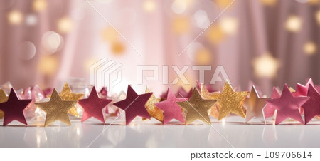 gold star shaped stars over white background with light shining through, gold star shaped stars over white background with light shining through, 109706614