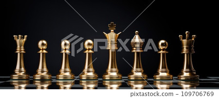 king stands alone with several chess pieces behind him king stands alone with several chess pieces behind him 109706769
