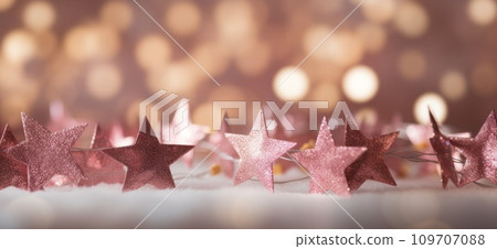 several gold stars arranged in the background christmas background 109707088