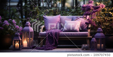 an outdoor garden setting with pillows, chairs, small vase 109707450
