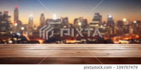 open wooden table and christmas tree in a cityscape background 109707479