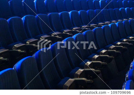 Full frame of folded bleachers in empty auditorium at conference hall Full frame of folded bleachers in empty auditorium at conference hall 109709696