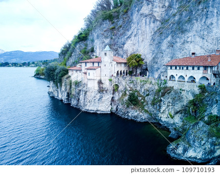Drone view at the monastery of Santa Caterina del Sasso on lake Maggiore Italy Drone view at the monastery of Santa Caterina del Sasso on lake Maggiore Italy 109710193