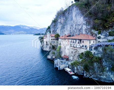 Drone view at the monastery of Santa Caterina del Sasso on lake Maggiore Italy Drone view at the monastery of Santa Caterina del Sasso on lake Maggiore Italy 109710194