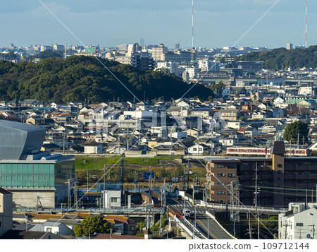Osaka cityscape with railway running through it Osaka cityscape with railway running through it 109712144